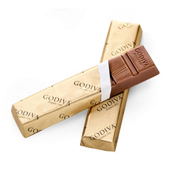 Godiva close-up of smooth milk chocolate surface showcasing creamy texture