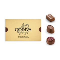 Godiva open box overhead view revealing 15 milk chocolates neatly arranged
