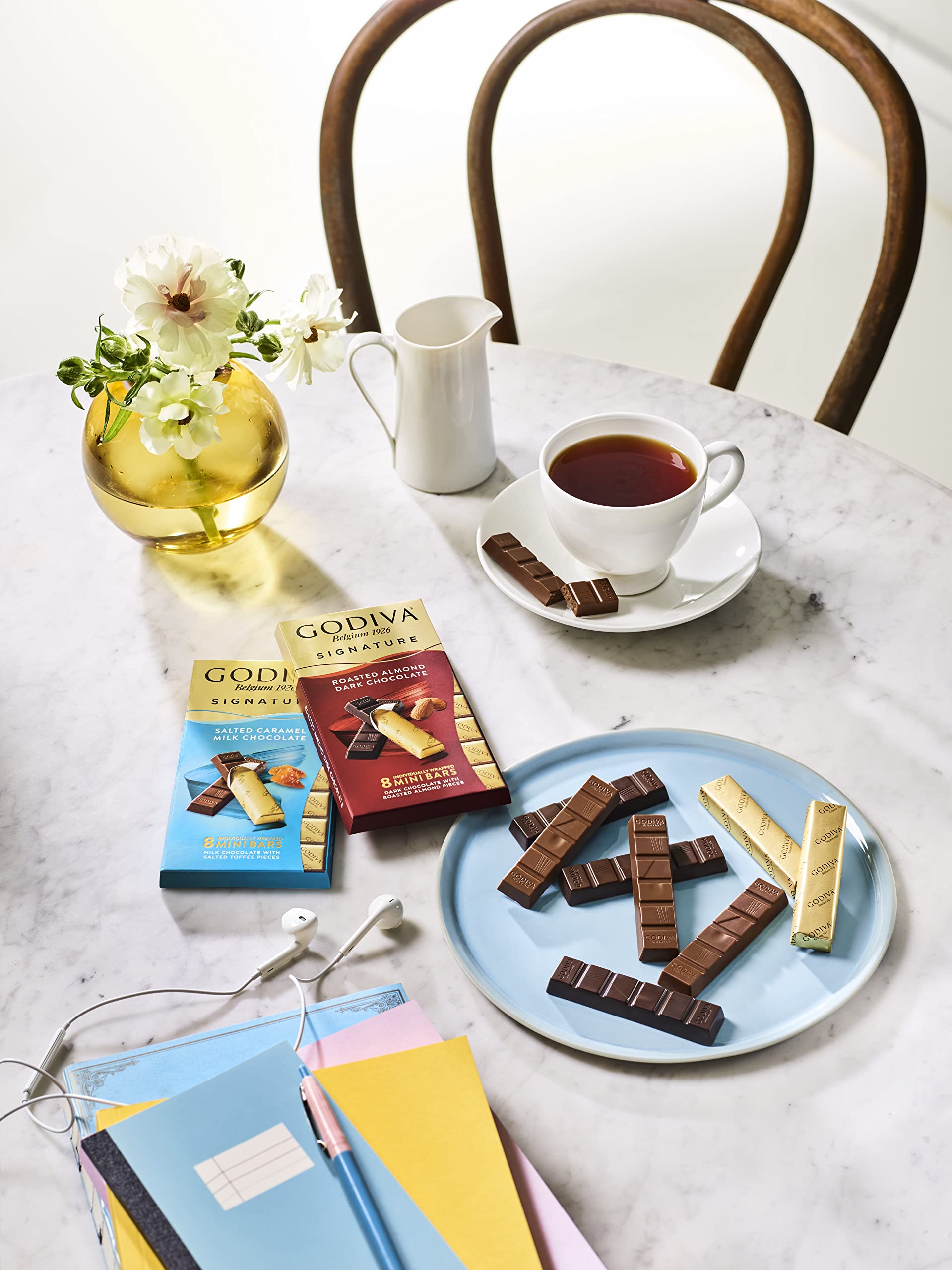 Godiva several mini bars on a plate for sharing and entertaining benefit