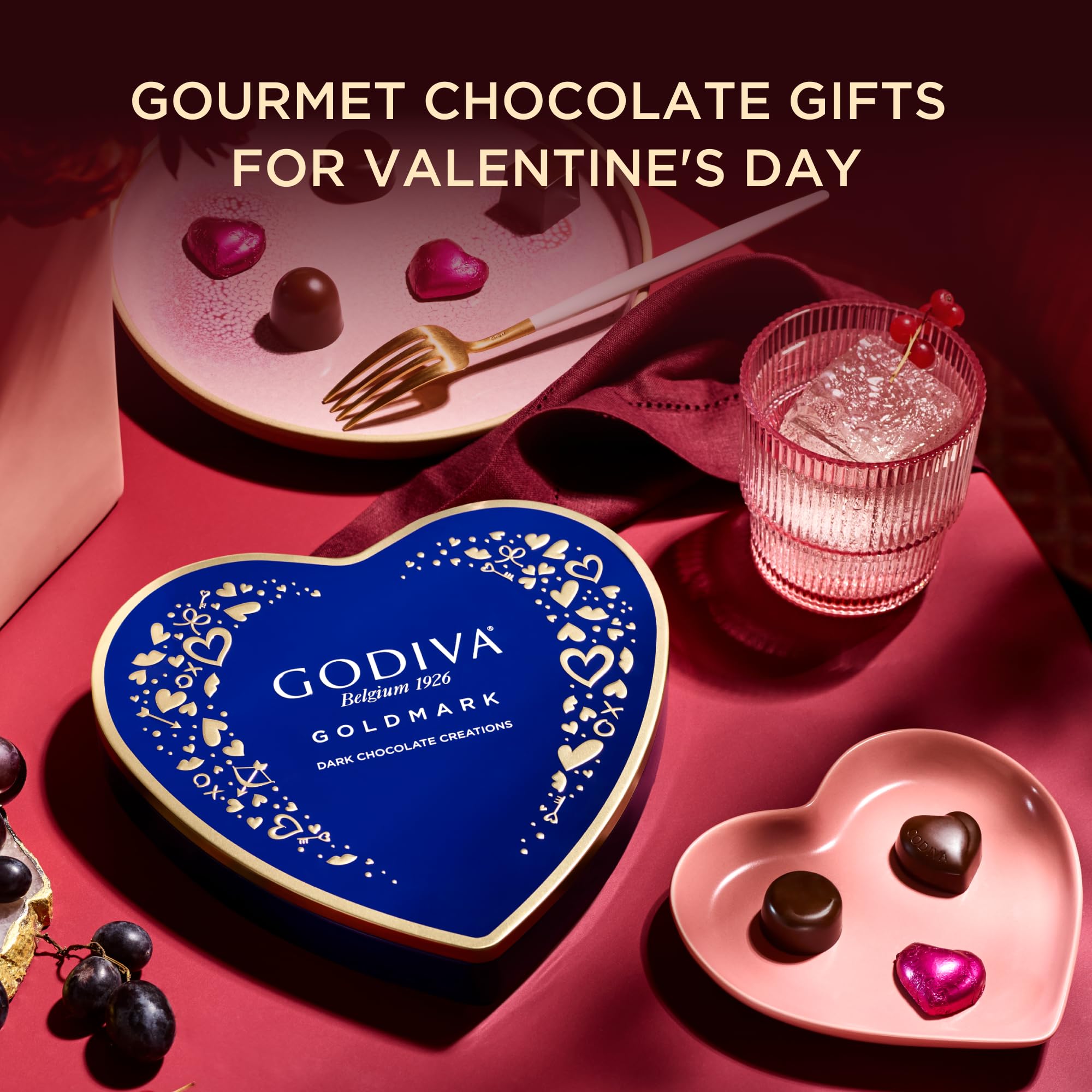 Godiva open tin displaying 14 assorted dark chocolates for sharing