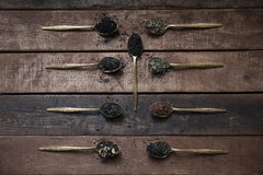 Golden Moon Tea steeping cup action shot showing clear color and aroma