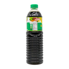 Golden Mountain bottle pouring seasoning close-up showing smooth consistency and control