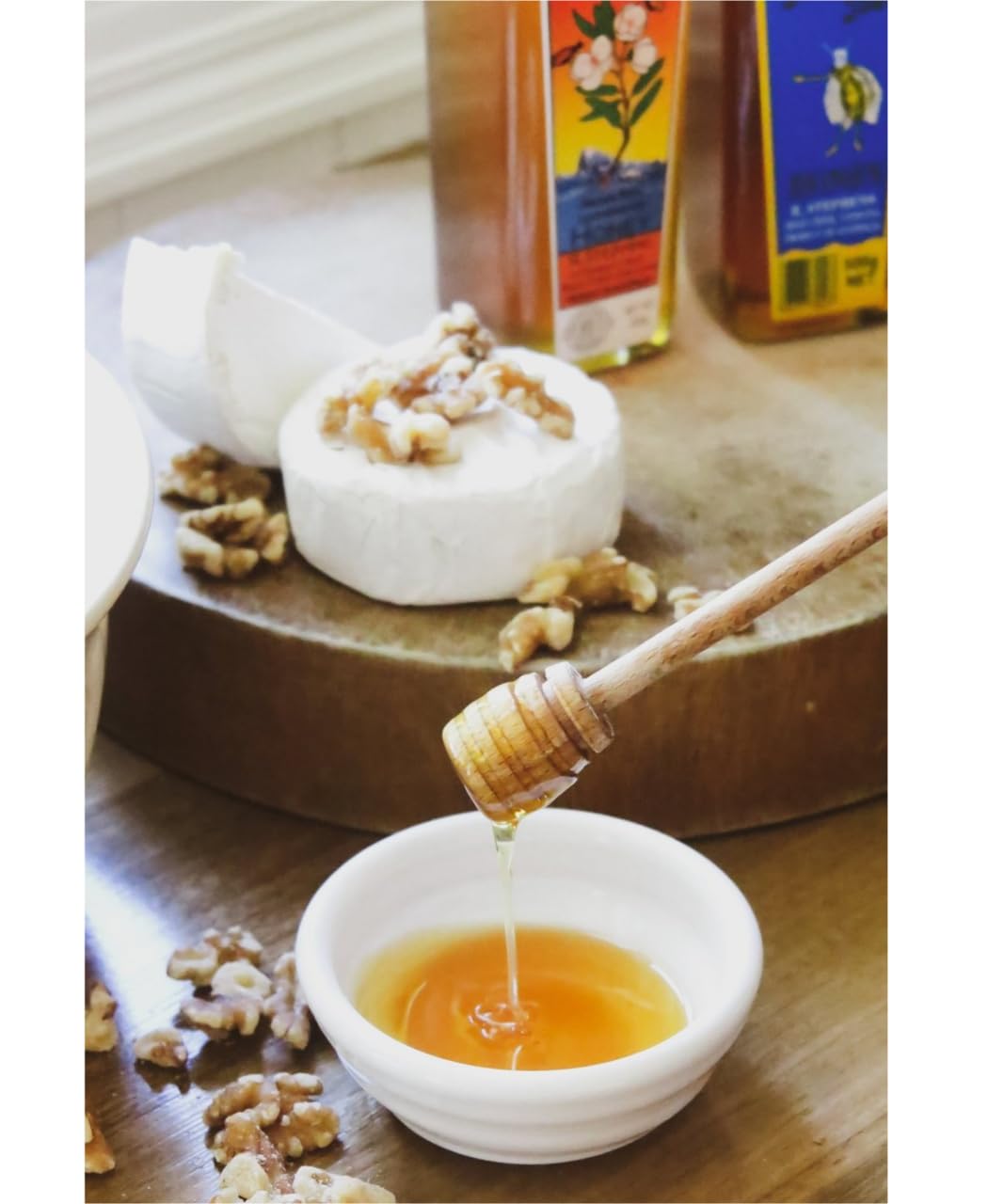Golden Nectar honey pouring from spoon to show silky consistency and rich aroma benefit