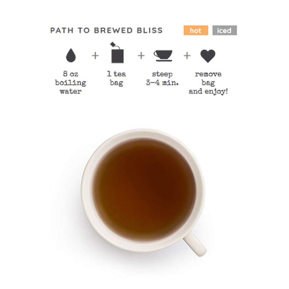 Good Earth Tea Co. steaming hot cup in hand showing comforting warm-spice benefit