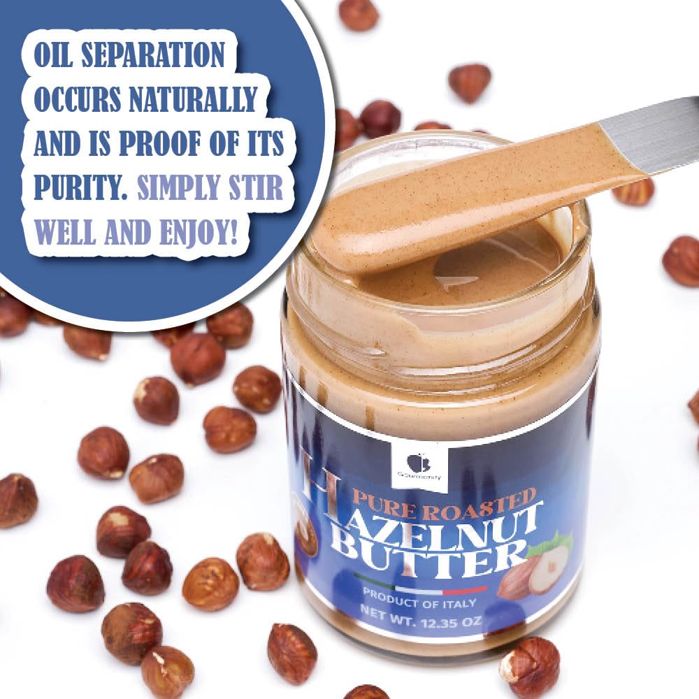 Gourmanity spoon lifting hazelnut butter demonstrating spreadability benefit