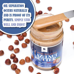 Gourmanity spoon lifting hazelnut butter demonstrating spreadability benefit