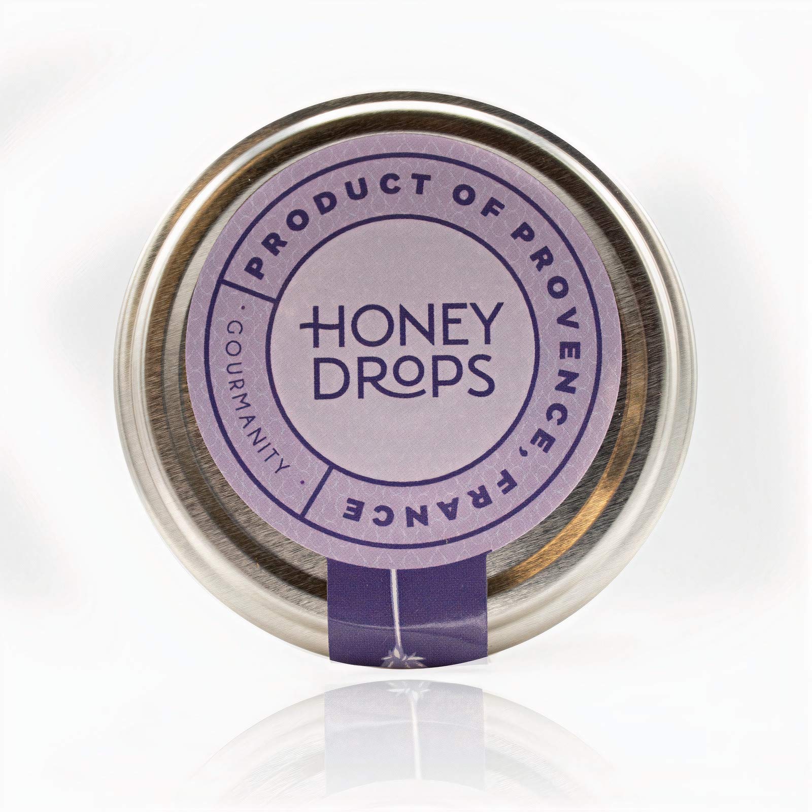 Gourmanity lavender sprigs and honey jar styled with candies to show natural ingredient story