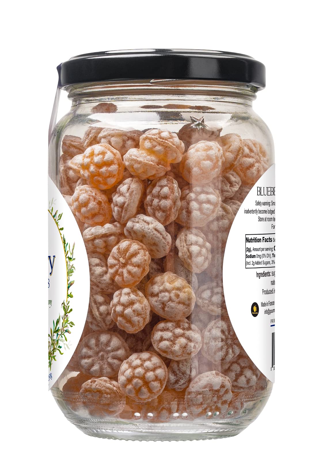 Gourmanity assorted lozenges spread on wood highlighting color and artisanal appeal