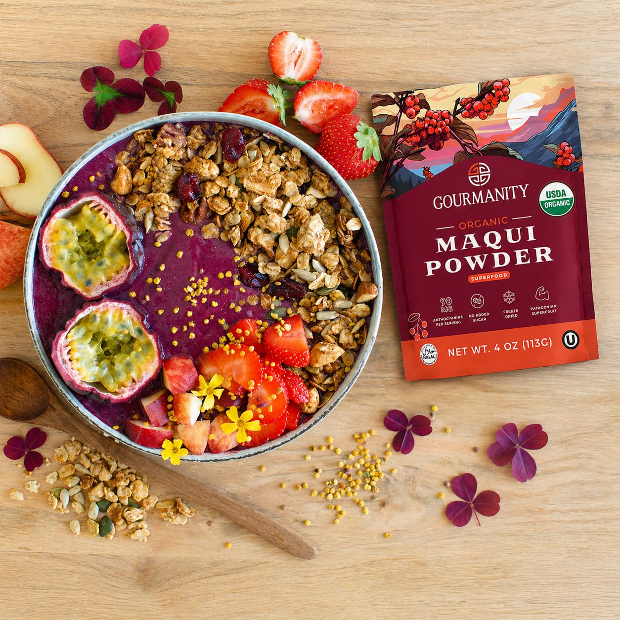 Gourmanity bowl of fresh maqui berries beside powder showing wild-harvest origin