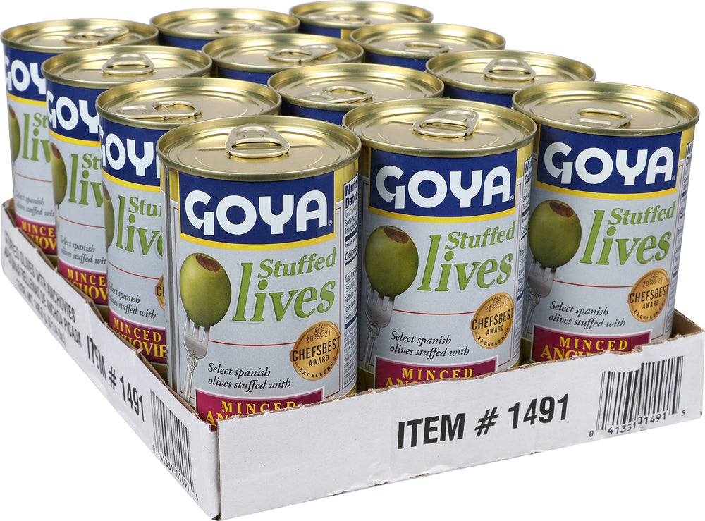 Goya anchovy-stuffed olives on charcuterie board as garnish, adds savory flavor