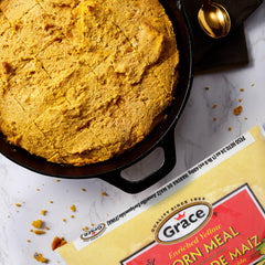 Grace close-up of fine cornmeal texture conveying smooth grind for consistent results