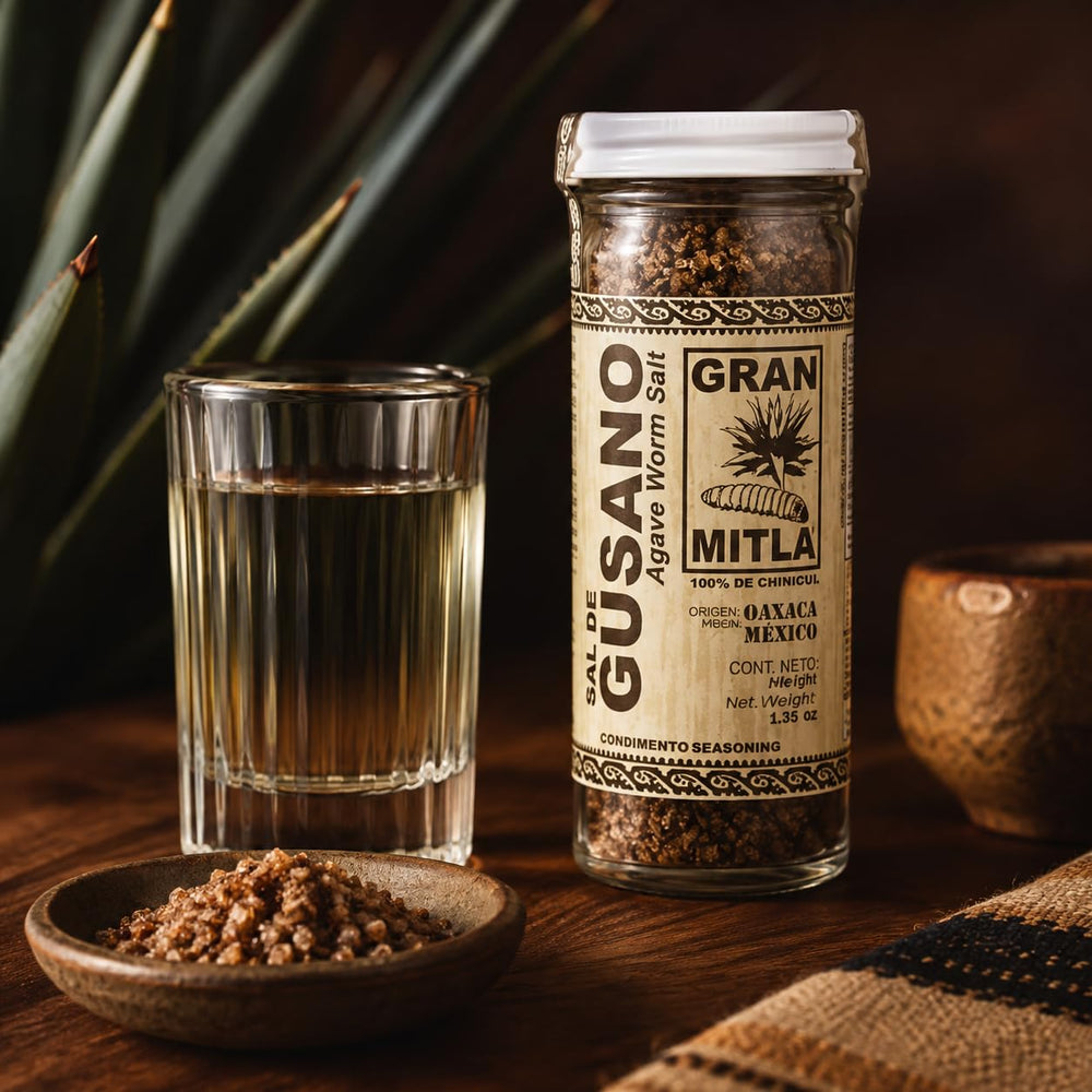 Gran Mitla salt rimmed on citrus slice adding bright cocktail flavor