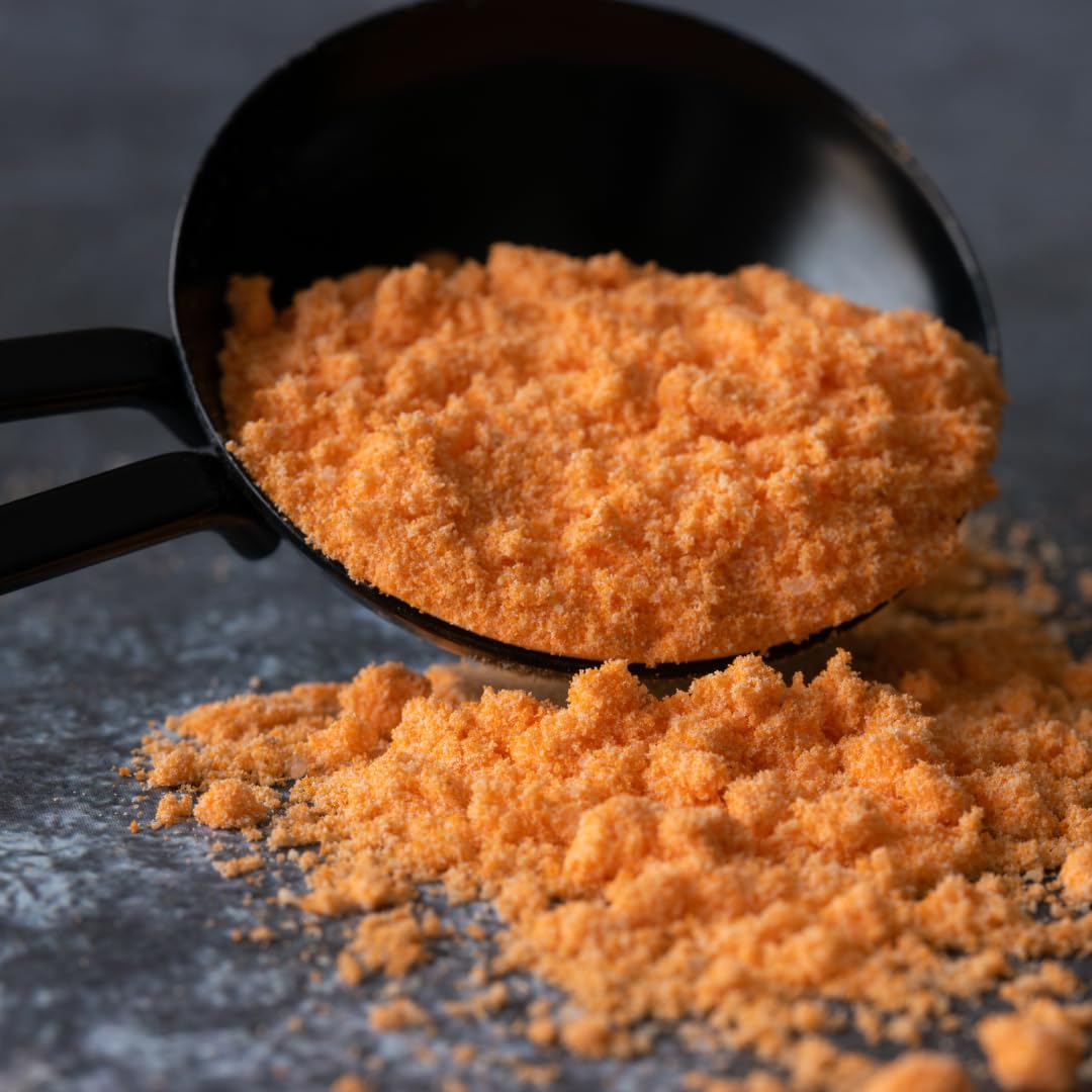 GranAroma cheddar biscuit with powder in dough illustrating baked-in savory flavor