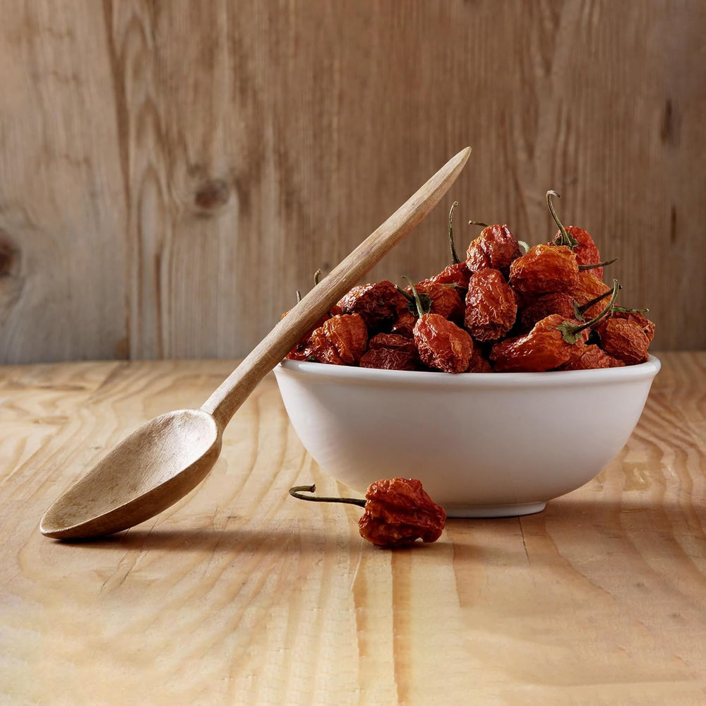 GranAroma jar beside kitchen spoon showing 8 ounce size for recipes