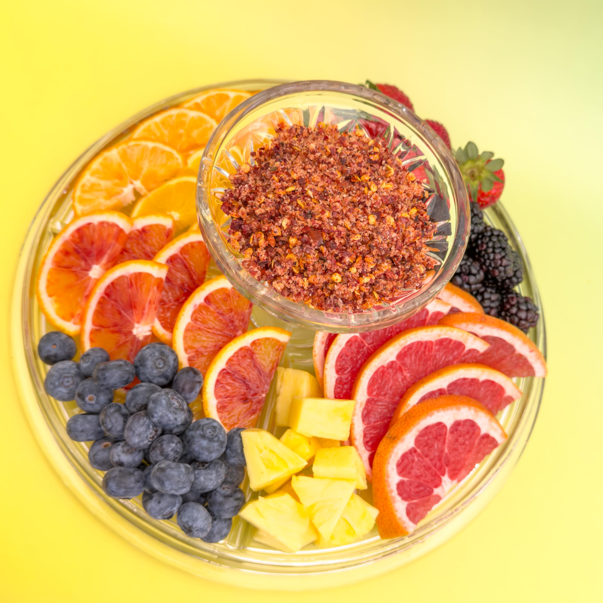 GrandpaKong sprinkled on mango slices adding spicy-savory contrast and balance
