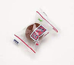 GREAT BRITISH TRADING close-up of a single umeboshi plum highlighting crunchy texture and bold flavor