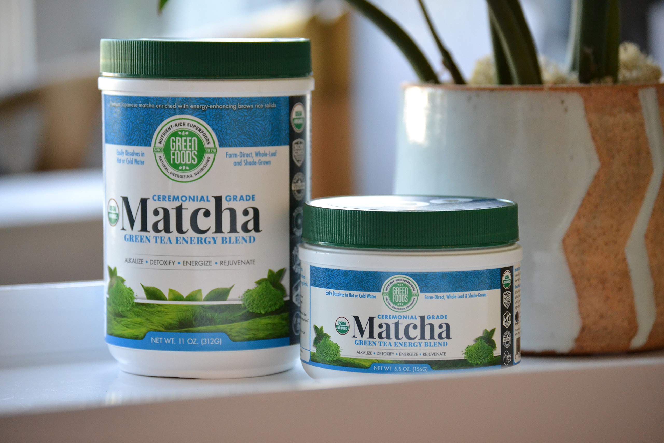 Green Foods matcha on spoon with scale demonstrating consistent measuring for recipes