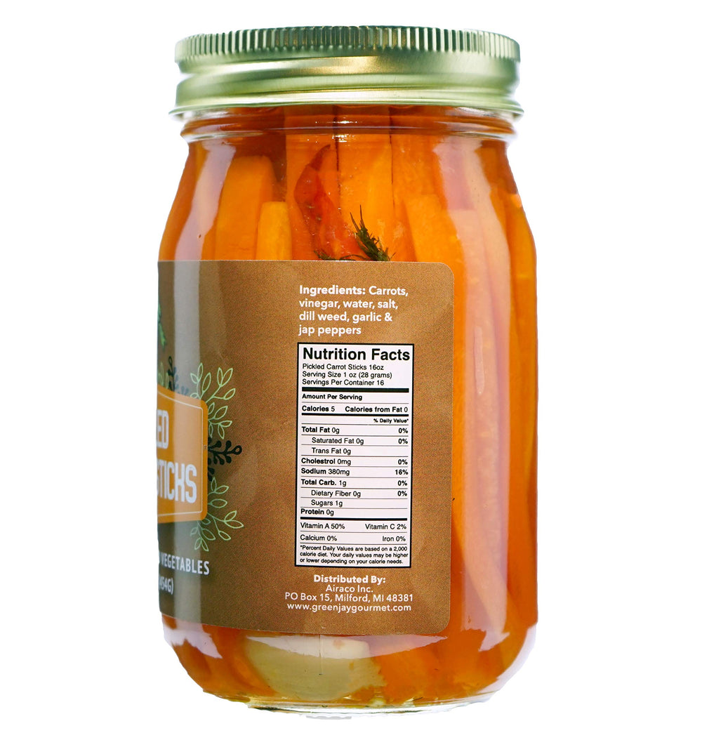 Close-up of pickled carrot sticks texture and crunch from Green Jay Gourmet, emphasizing crisp freshness