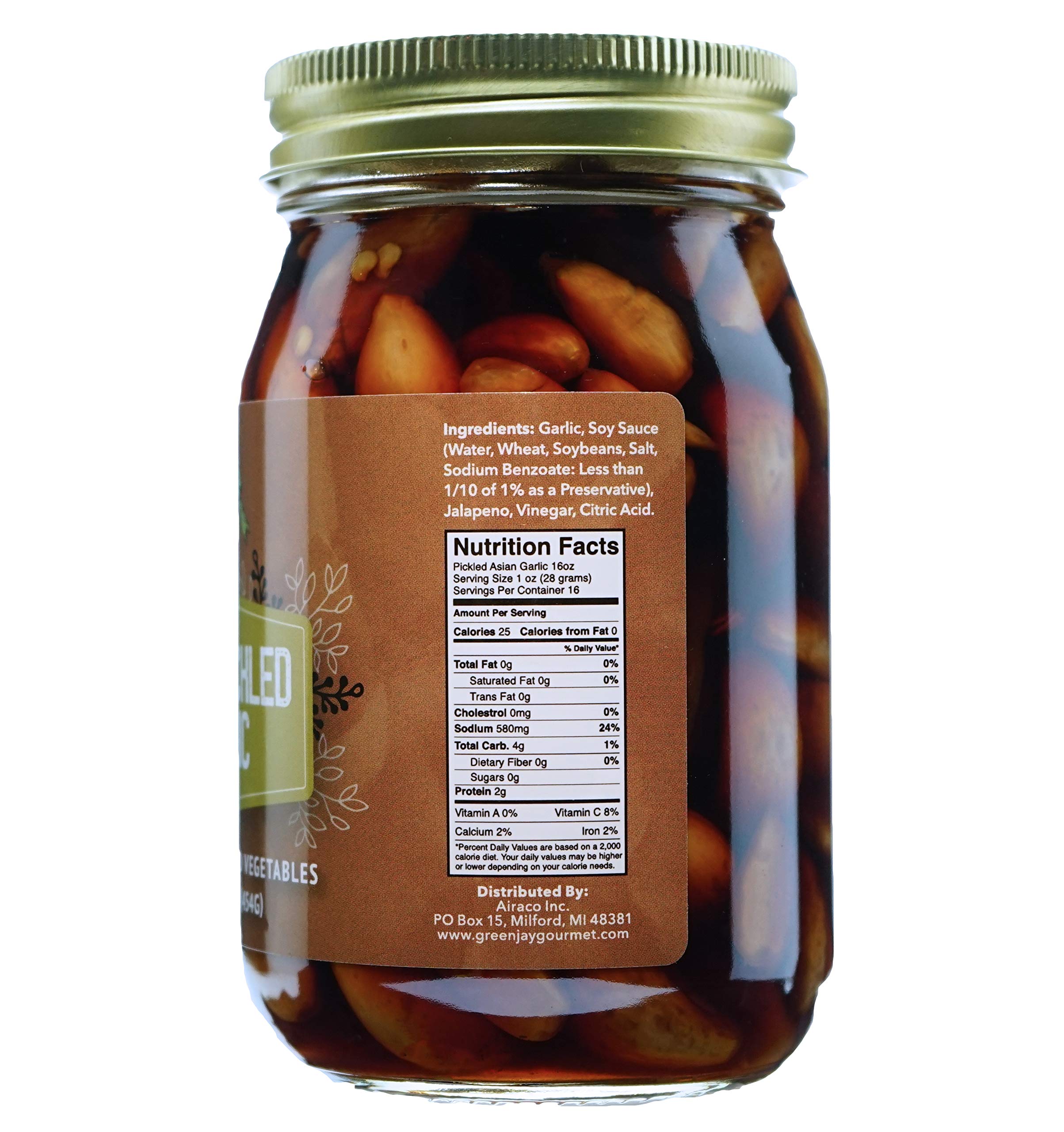 Green Jay Gourmet close-up of individual pickled garlic cloves, tender texture visible