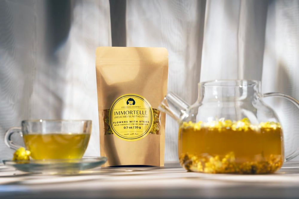 GRIGORIAN GOURMET harvesters collecting immortelle in Armenian mountains, emphasizes wild sourcing