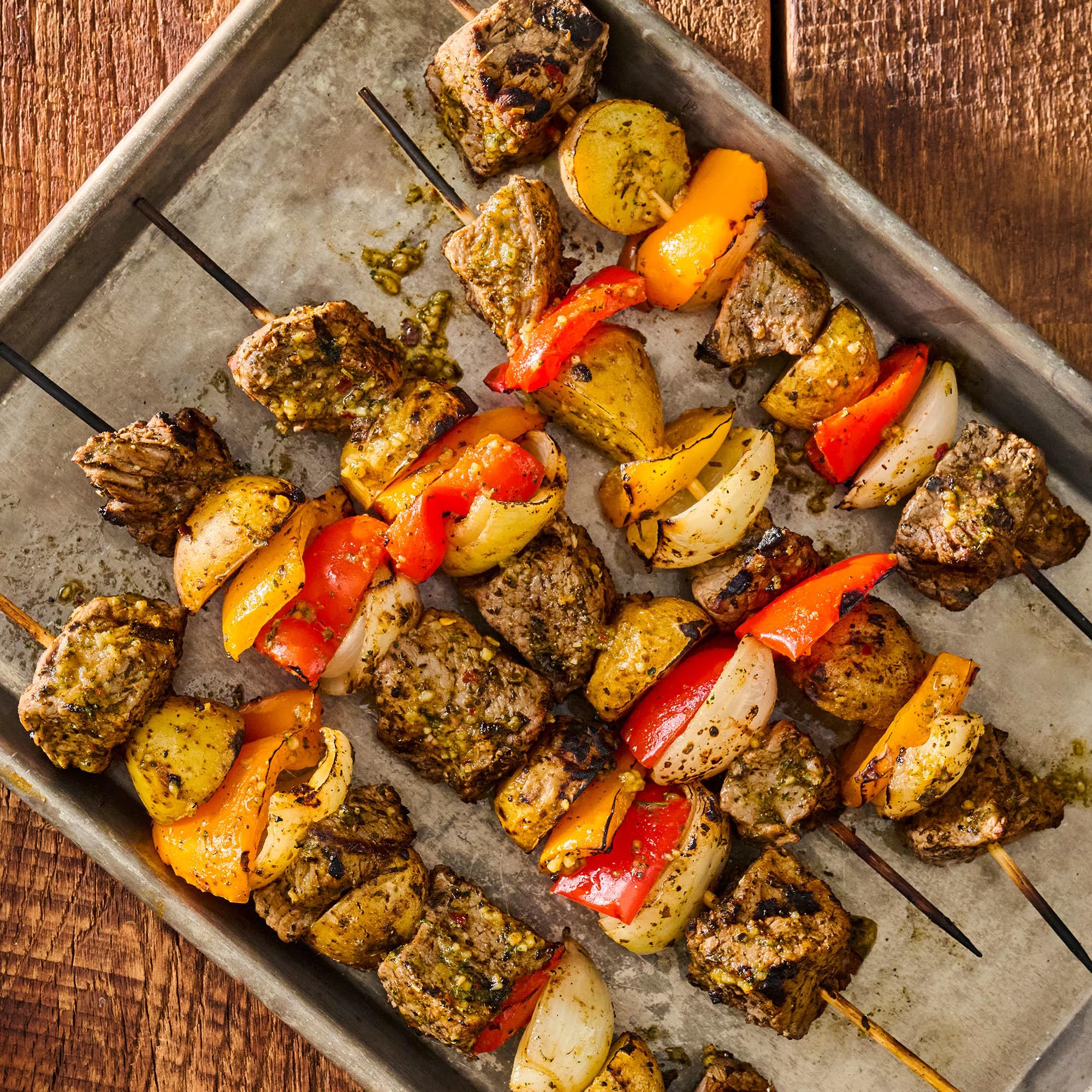 Grill Mates mix in bowl with cilantro, garlic and peppers to show fresh-inspired ingredients