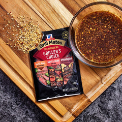 Grill Mates marinated steak in bowl ready to grill with visible seasoning
