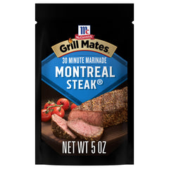 Grill Mates pouch being opened and poured over meat for quick flavor