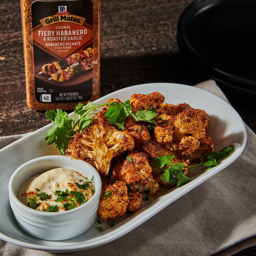 Grill Mates jar by a backyard grill illustrating quick meal prep benefits