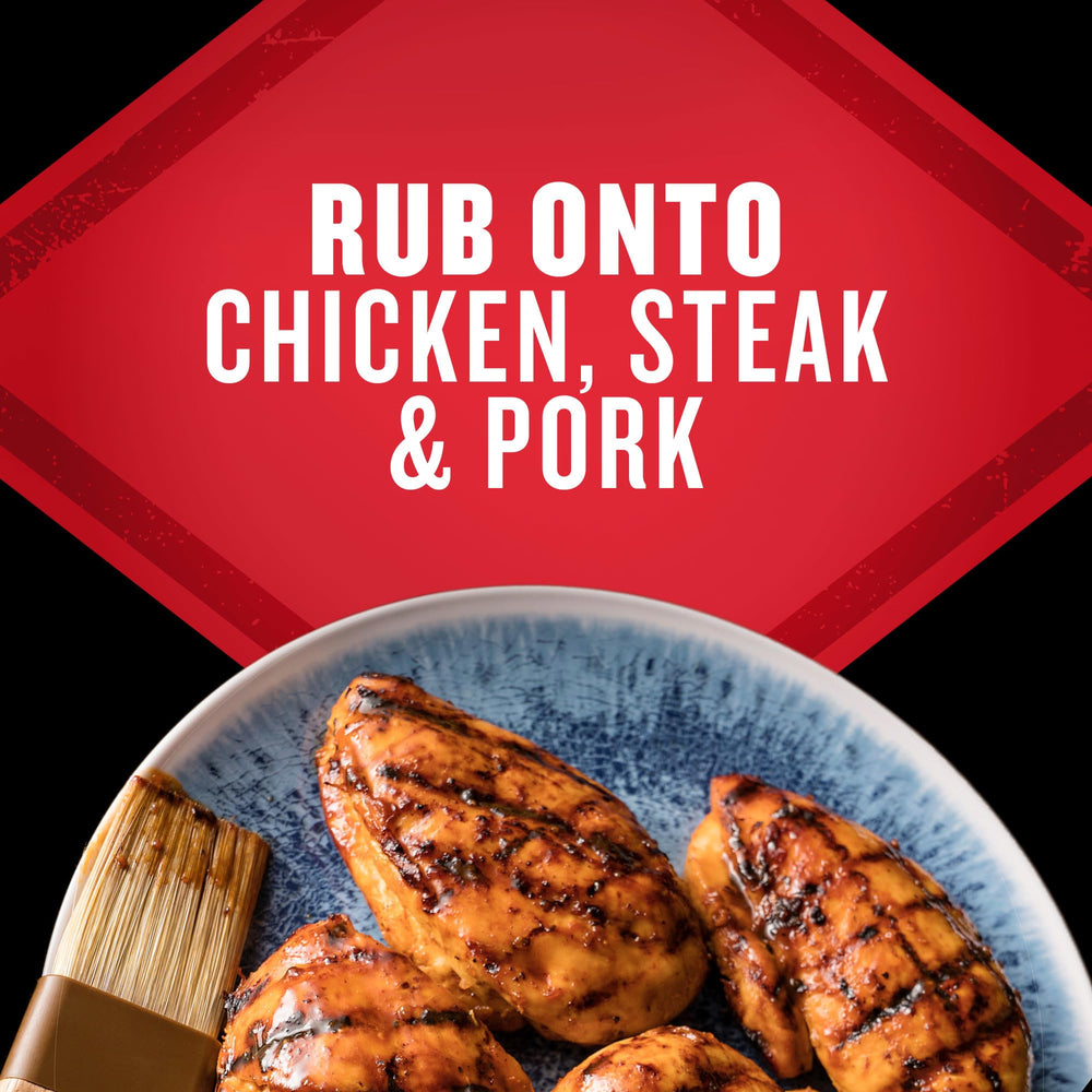 Grill Mates McCormick poured from shaker into wooden spoon for portioning