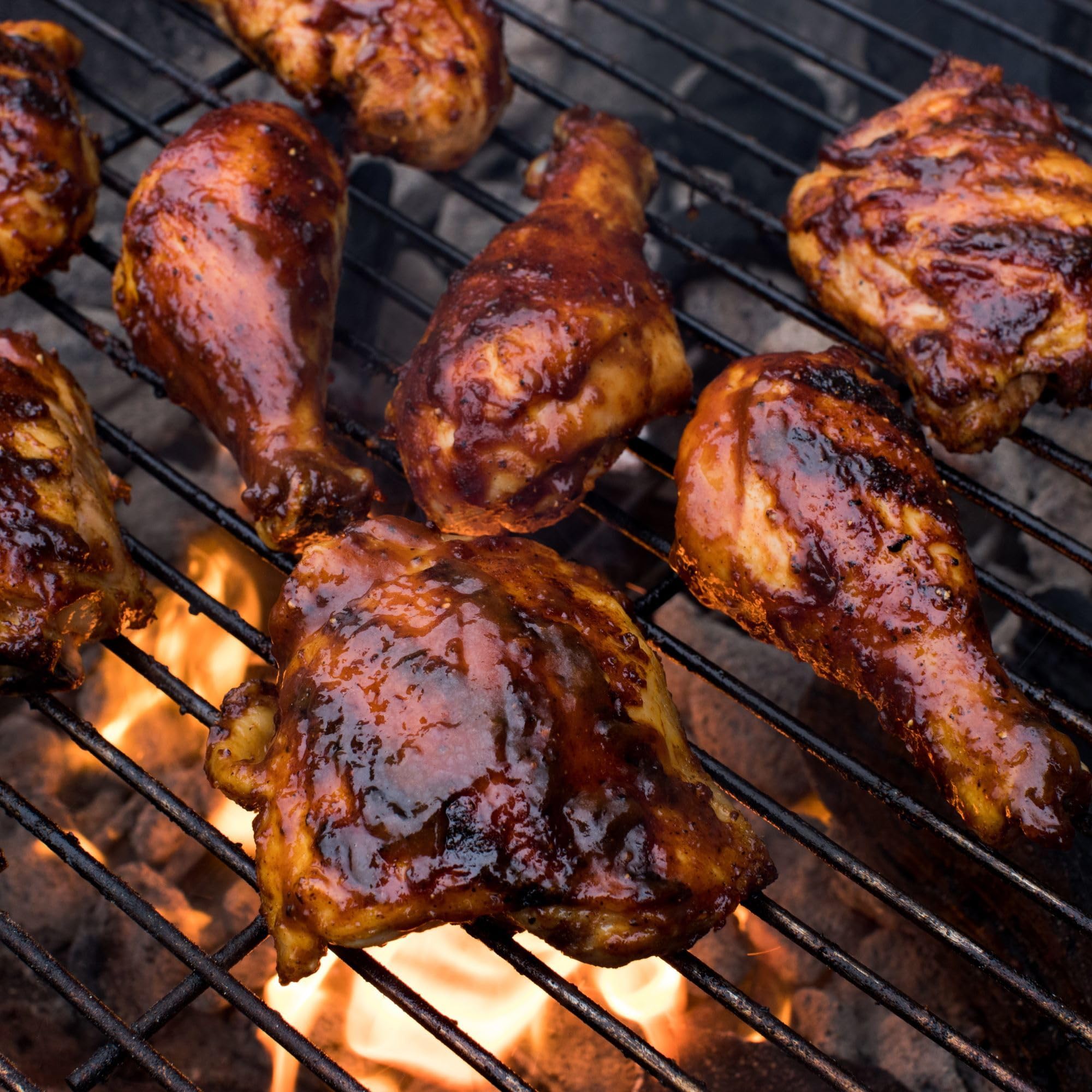 Backyard grilling scene using Grill Mates for a family cookout with smoky aroma
