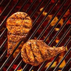 Mixing bowl with Grill Mates packet, oil, vinegar and water ready to marinate