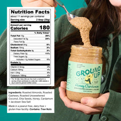 Ground Up spoon scooping creamy nut butter demonstrating spreadability