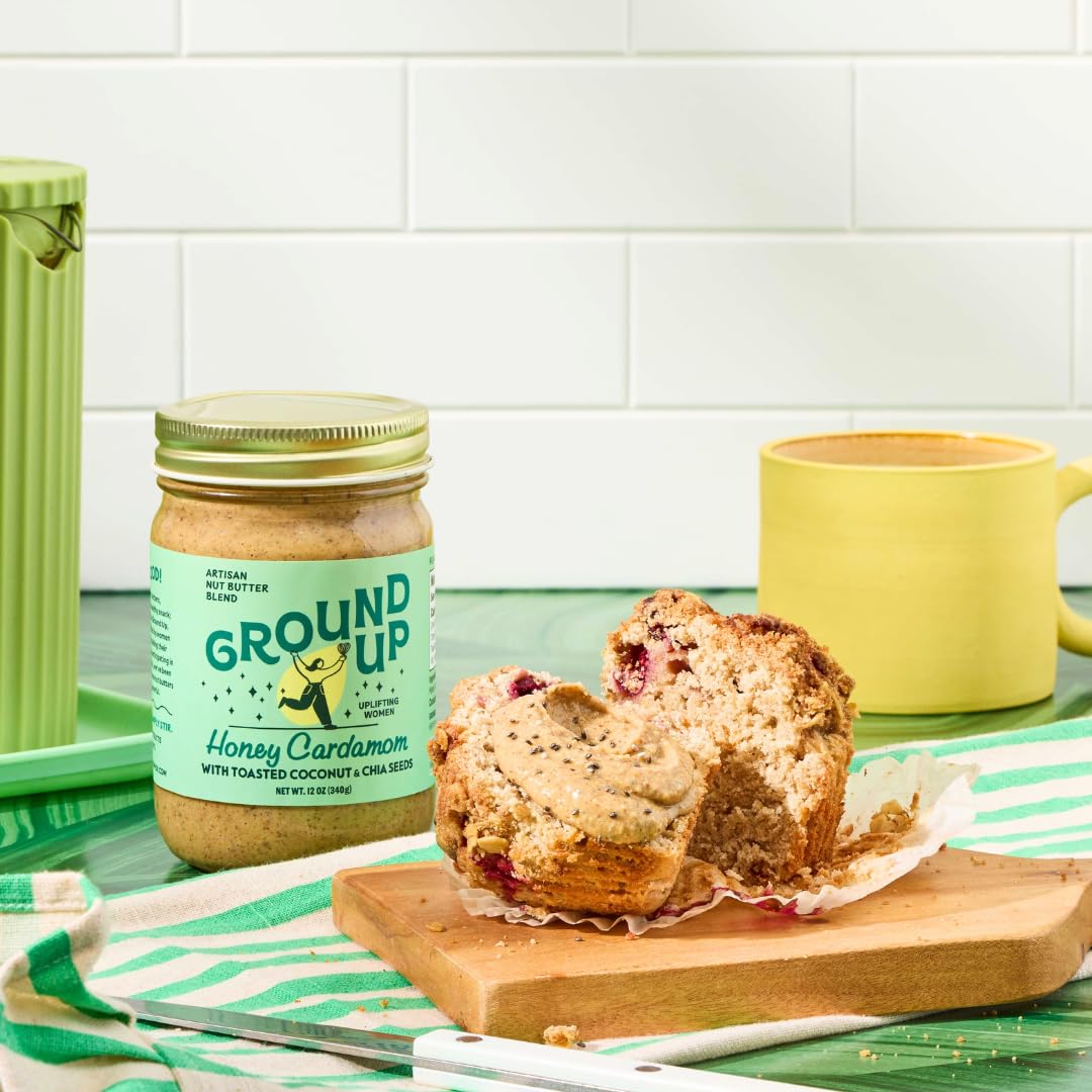 Ground Up 12oz jar held in hand to show scale and portion size