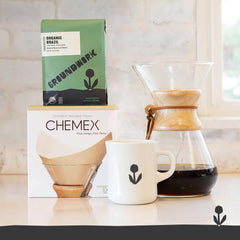 Groundwork 12 oz bag beside a coffee cup illustrating portion and serving expectations