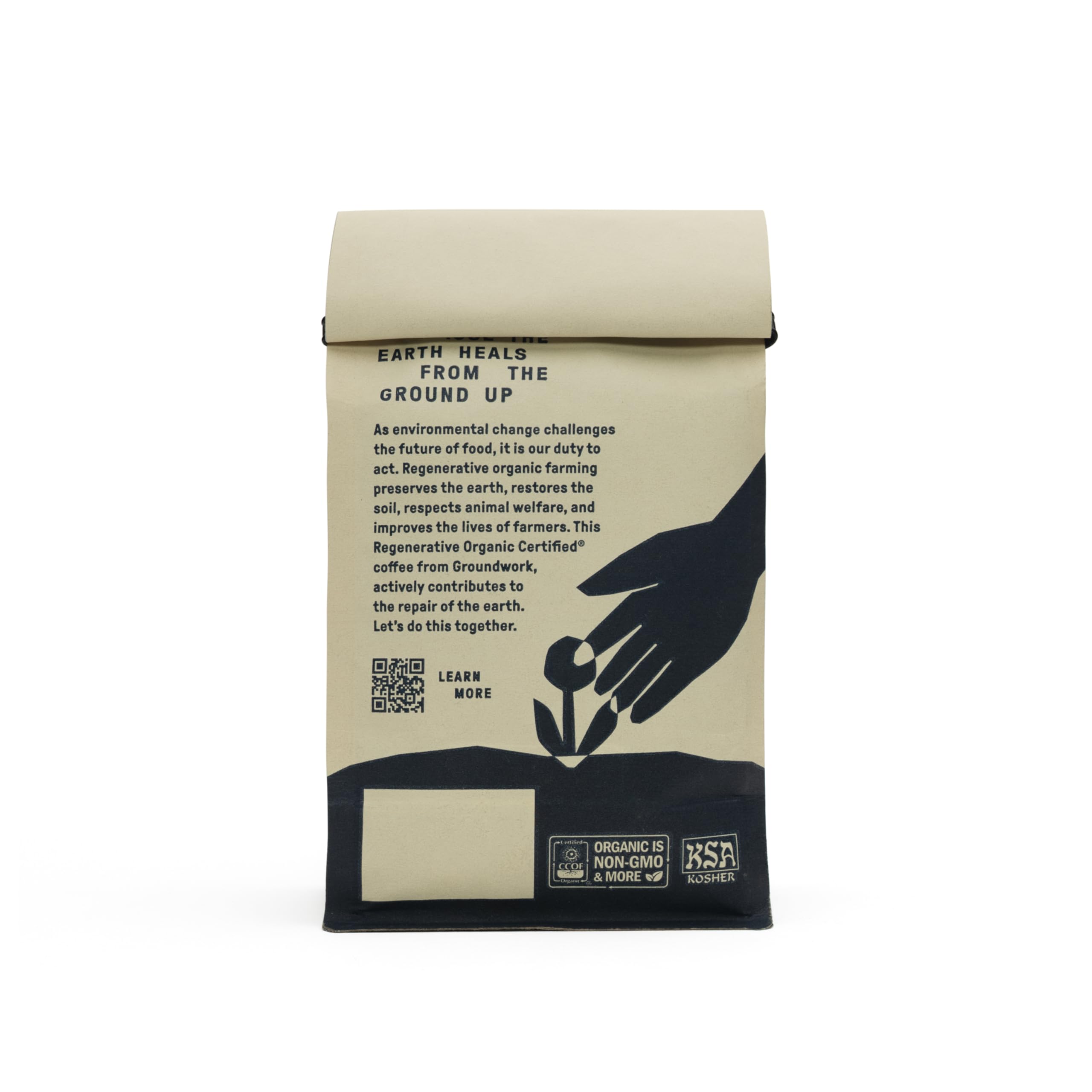 Groundwork cup and bag on breakfast table suggesting everyday sustainable enjoyment