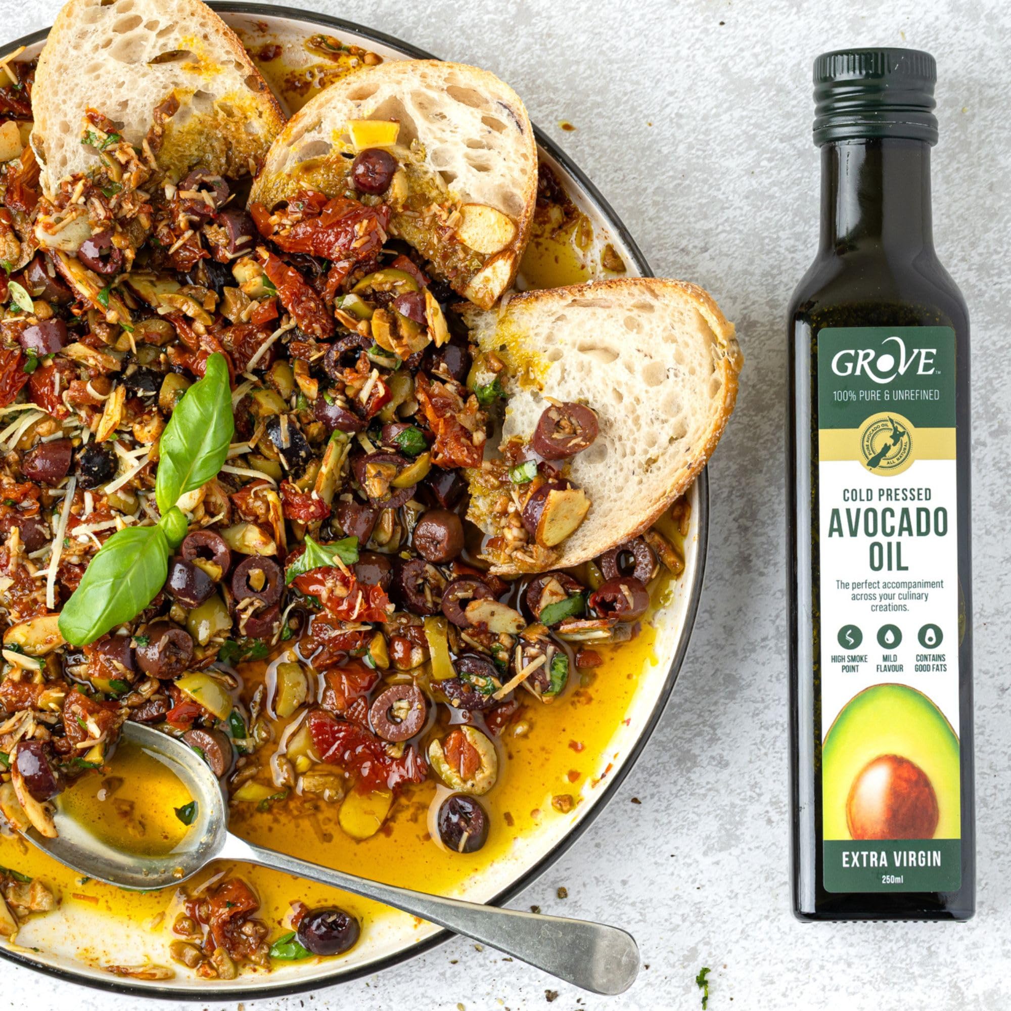 Grove fresh avocados beside bottle showing natural source and first-press quality