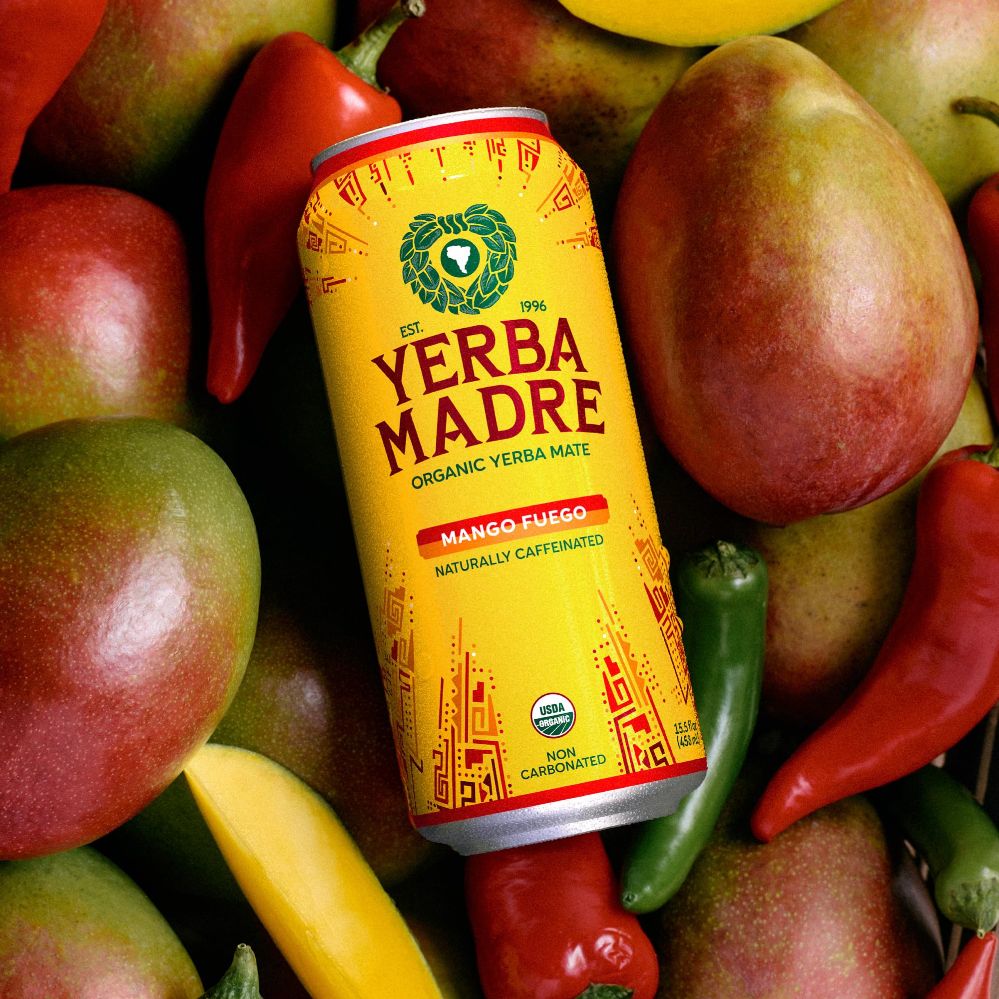 Guayaki Mango Fuego splash with mango pieces highlighting real fruit flavor