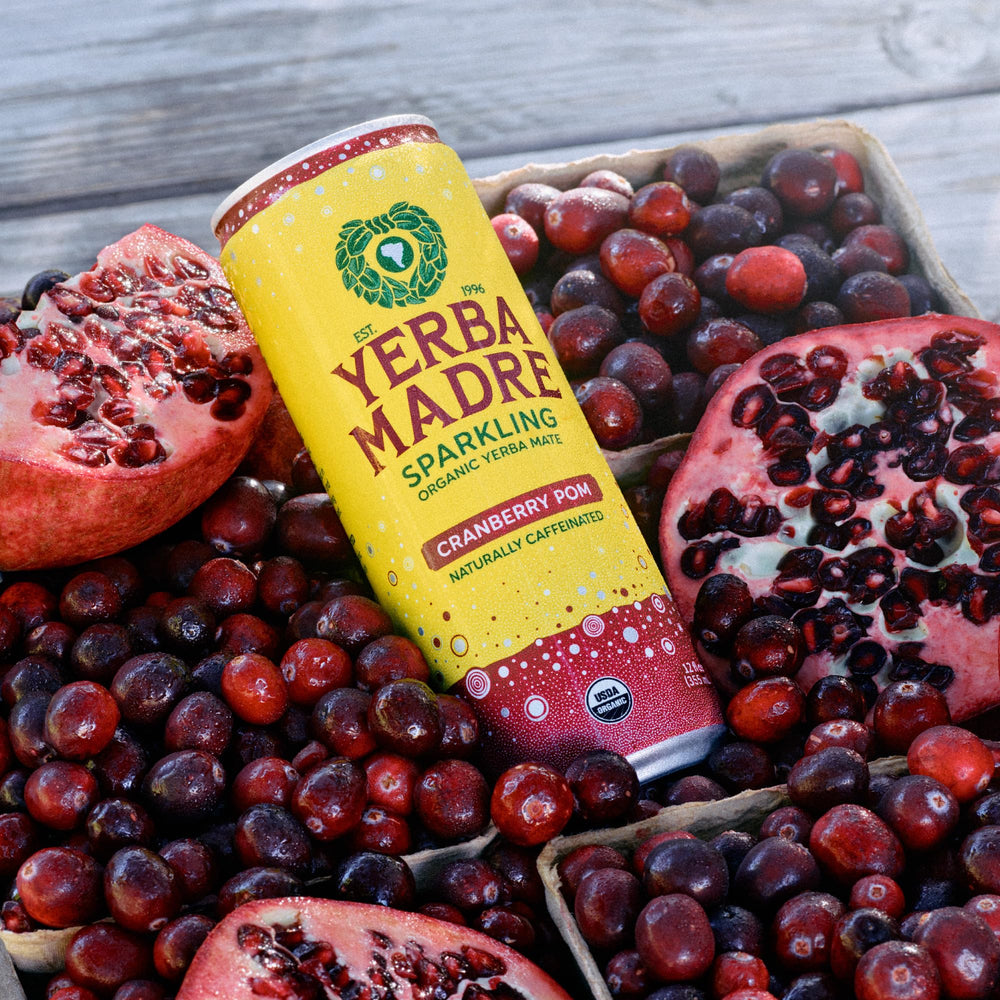 Guayaki Yerba Madre ingredient focus with mate leaves and cranberries showing natural sourcing
