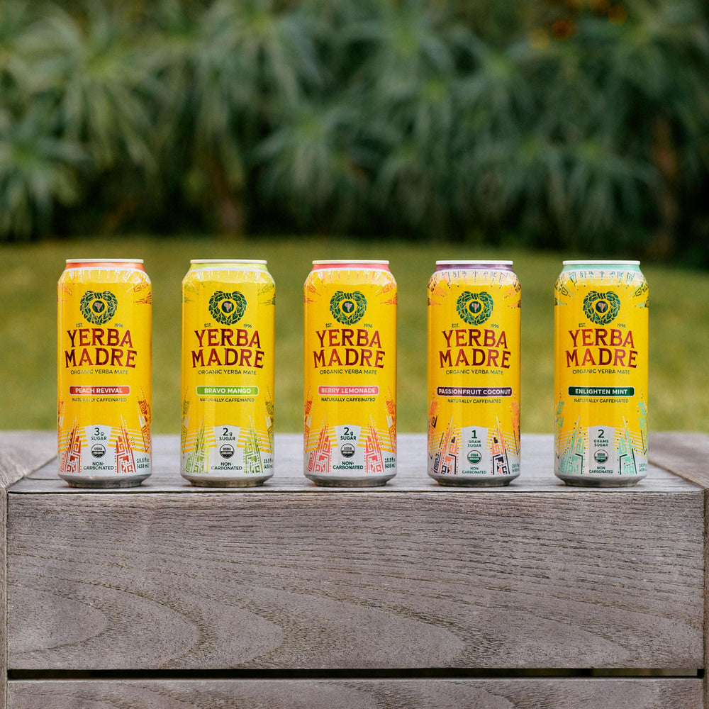 Topped glass close-up showing Guayaki’s clear liquid texture and light foam