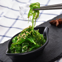 GXXDMZAQ opened pack displaying seasoned wakame ready-to-serve for convenience