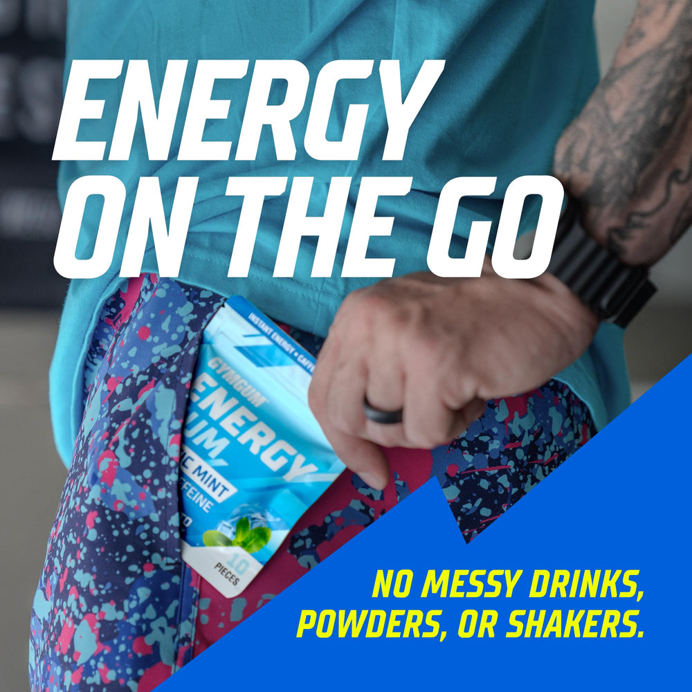 GYMGUM tub inside gym bag with towel and earbuds demonstrating workout-ready energy