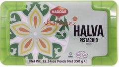 Haddar halva texture close-up revealing tahini marbling and pistachio pieces for rich mouthfeel