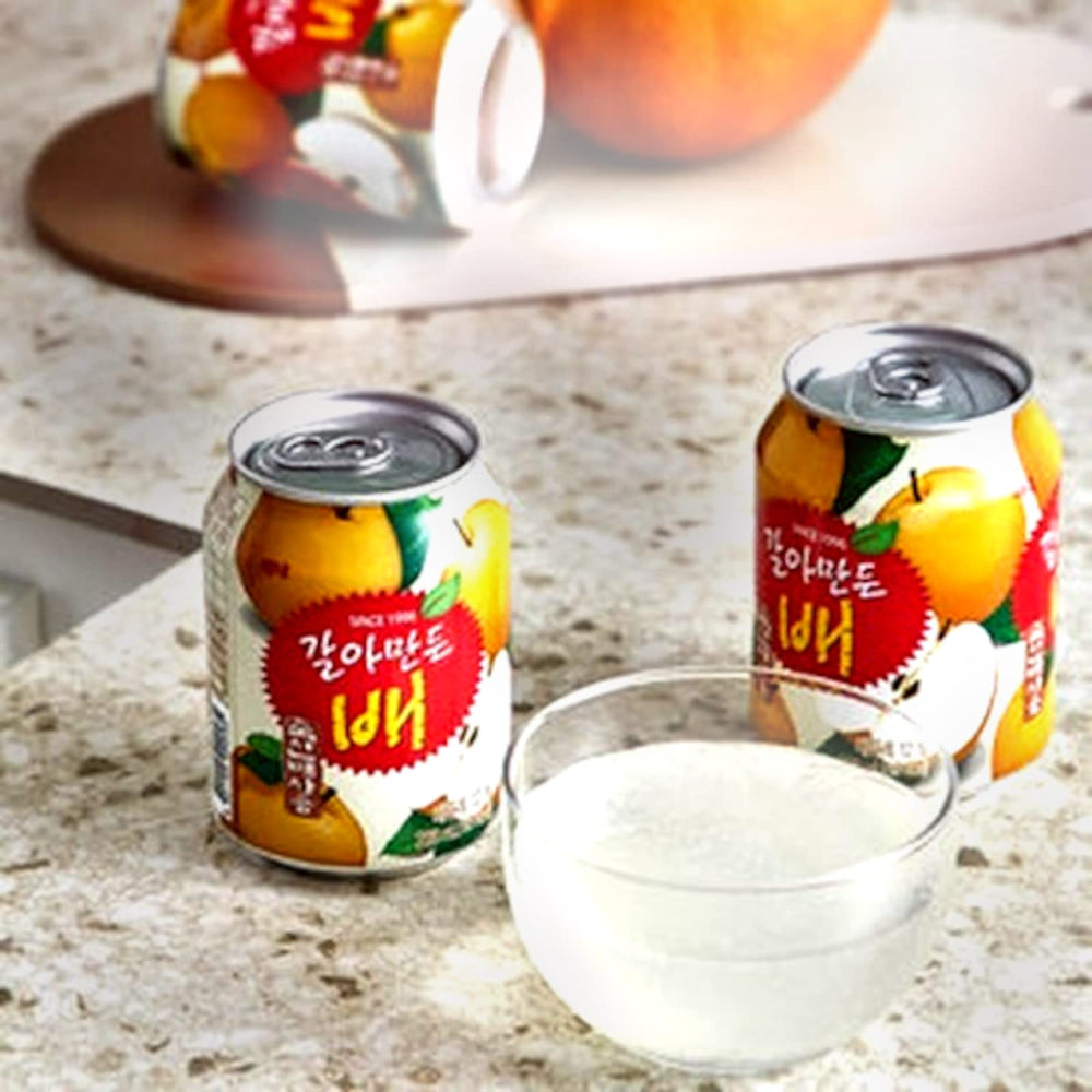 Haitai pear juice served in a chilled glass with ice, refreshing Korean drink for gatherings