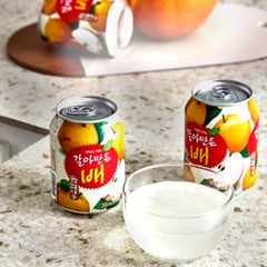 Haitai pear juice served in a chilled glass with ice, refreshing Korean drink for gatherings