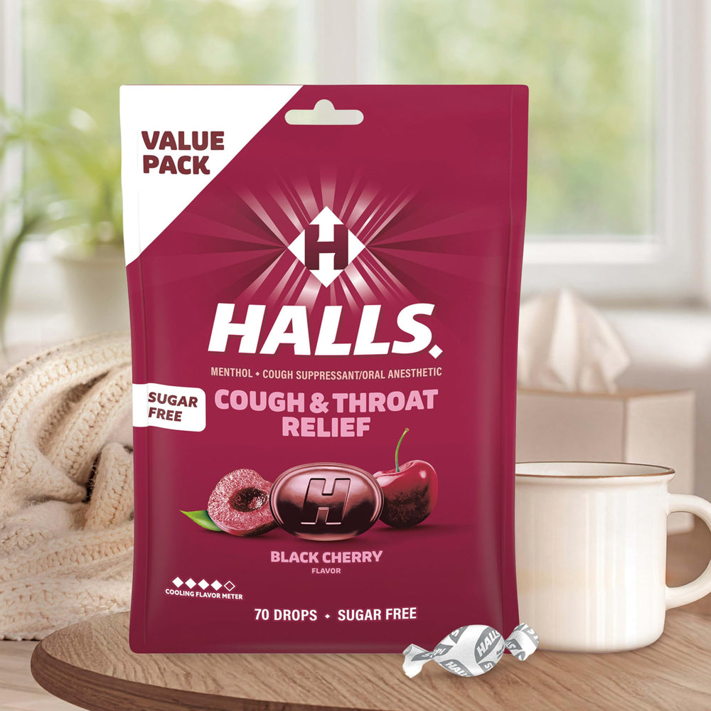 HALLS lozenge next to a coin showing size and easy portioning
