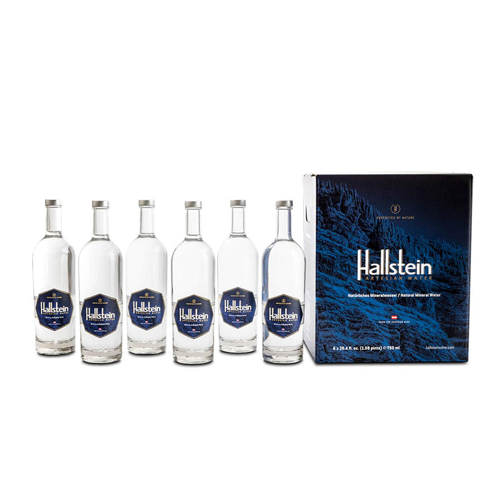 Hallstein front bottle with alpine backdrop showing pure source and premium presentation