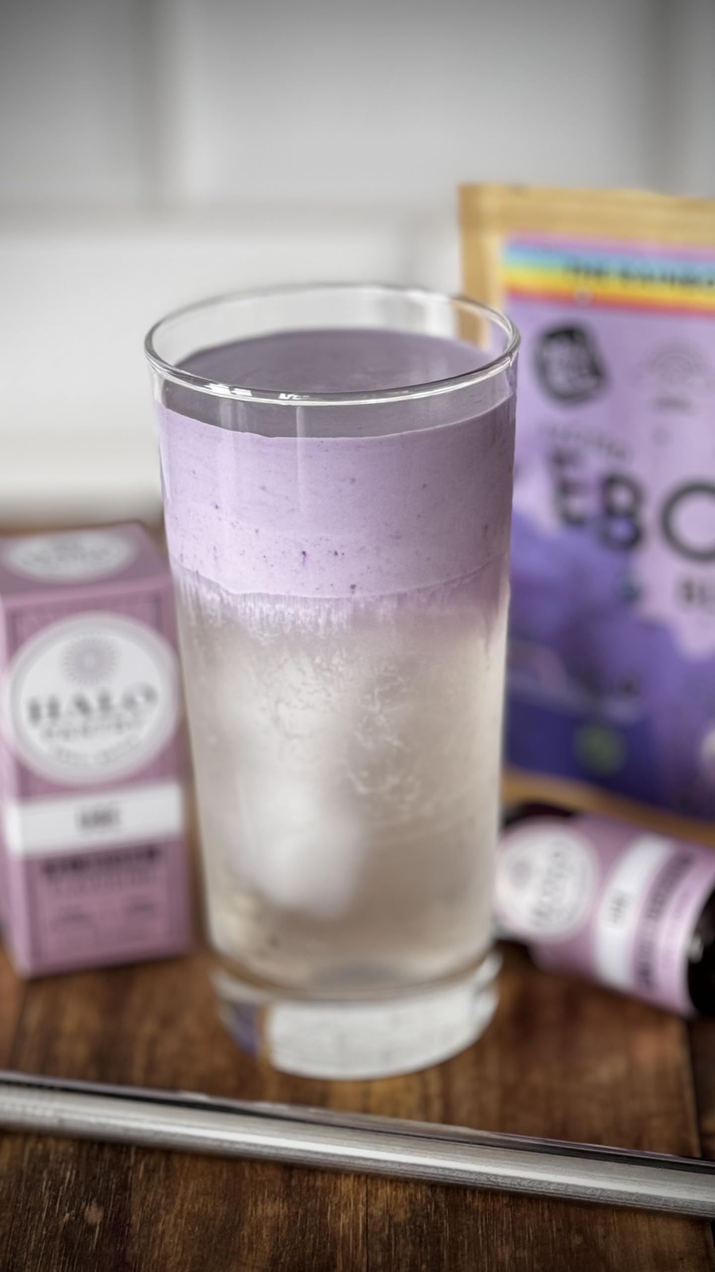 HALO PANTRY bottle in hand for scale demonstrating compact 2oz convenience