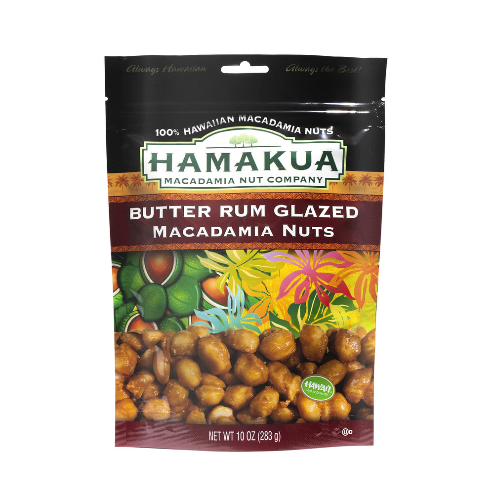 Hamakua macadamia next to coin for size comparison showing large kernel benefit