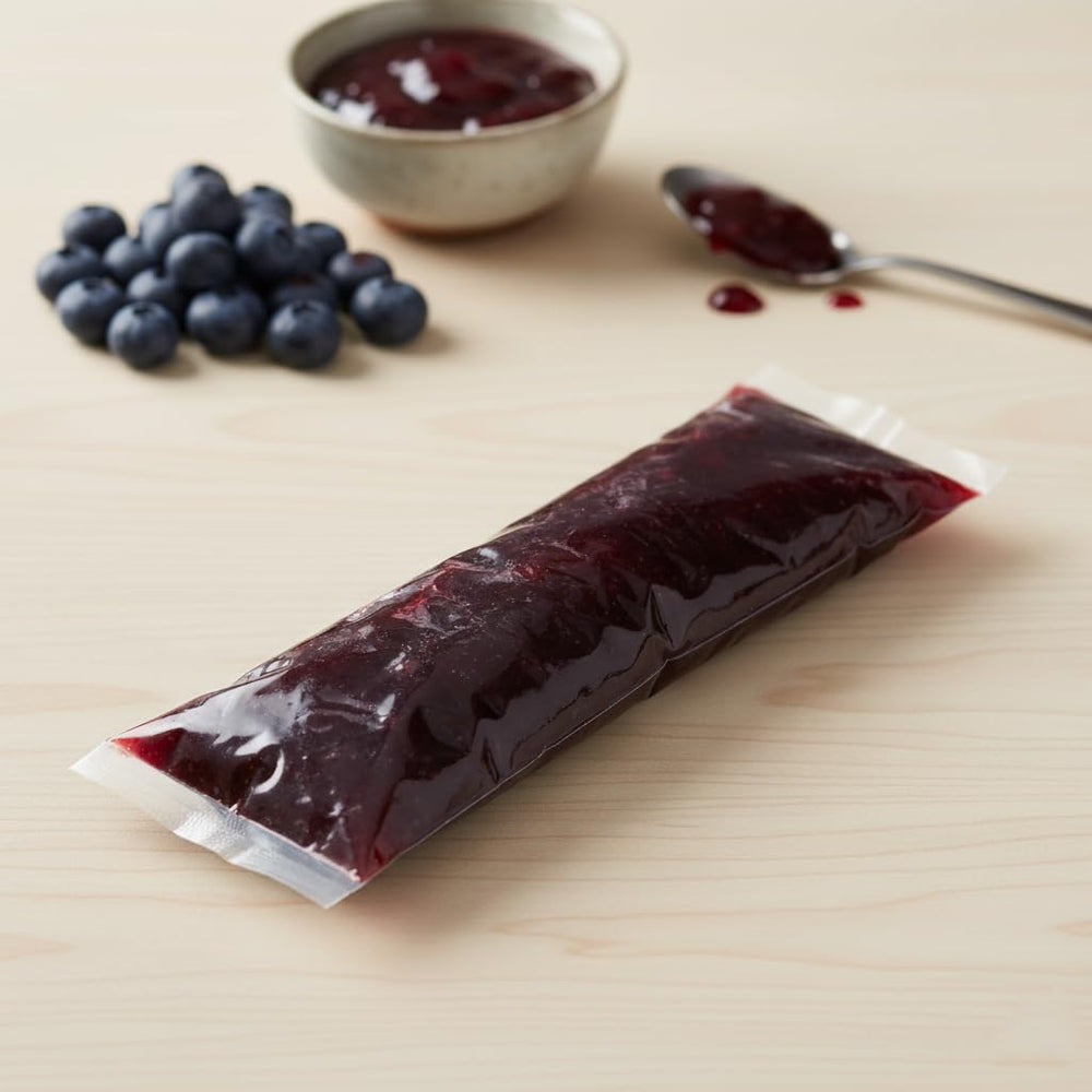 Hampton Distribution 2 lb squeeze bag beside ruler for scale helps buyers visualize portion size