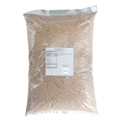 Close-up texture of Hampton Distribution wheat bran showing coarse flakes and baking versatility